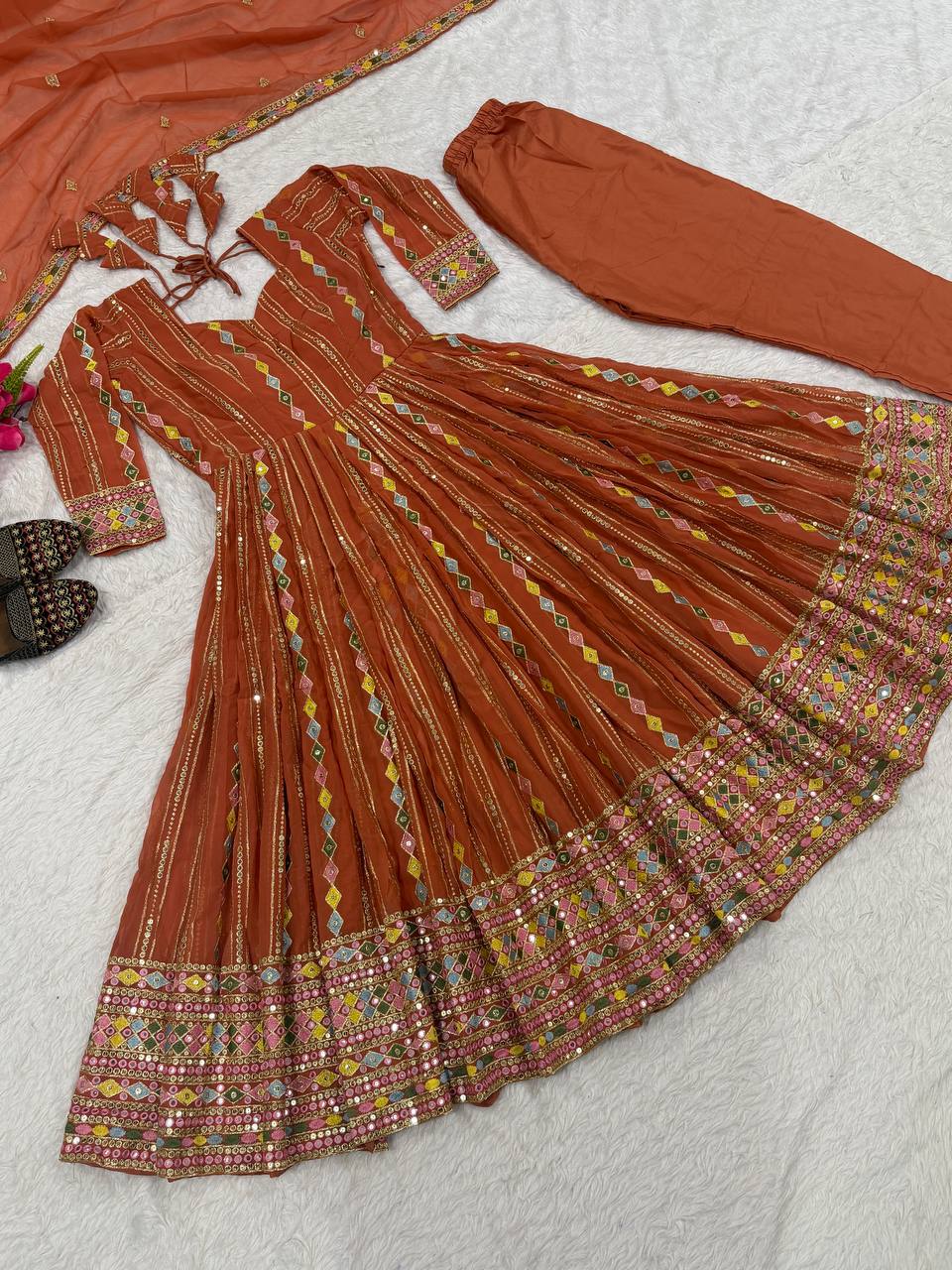 Radiant Rust Orange Flared Anarkali Suit Set Adorned with Multicolored Geometric Embroidery and Dazzling Mirror Work Detailing